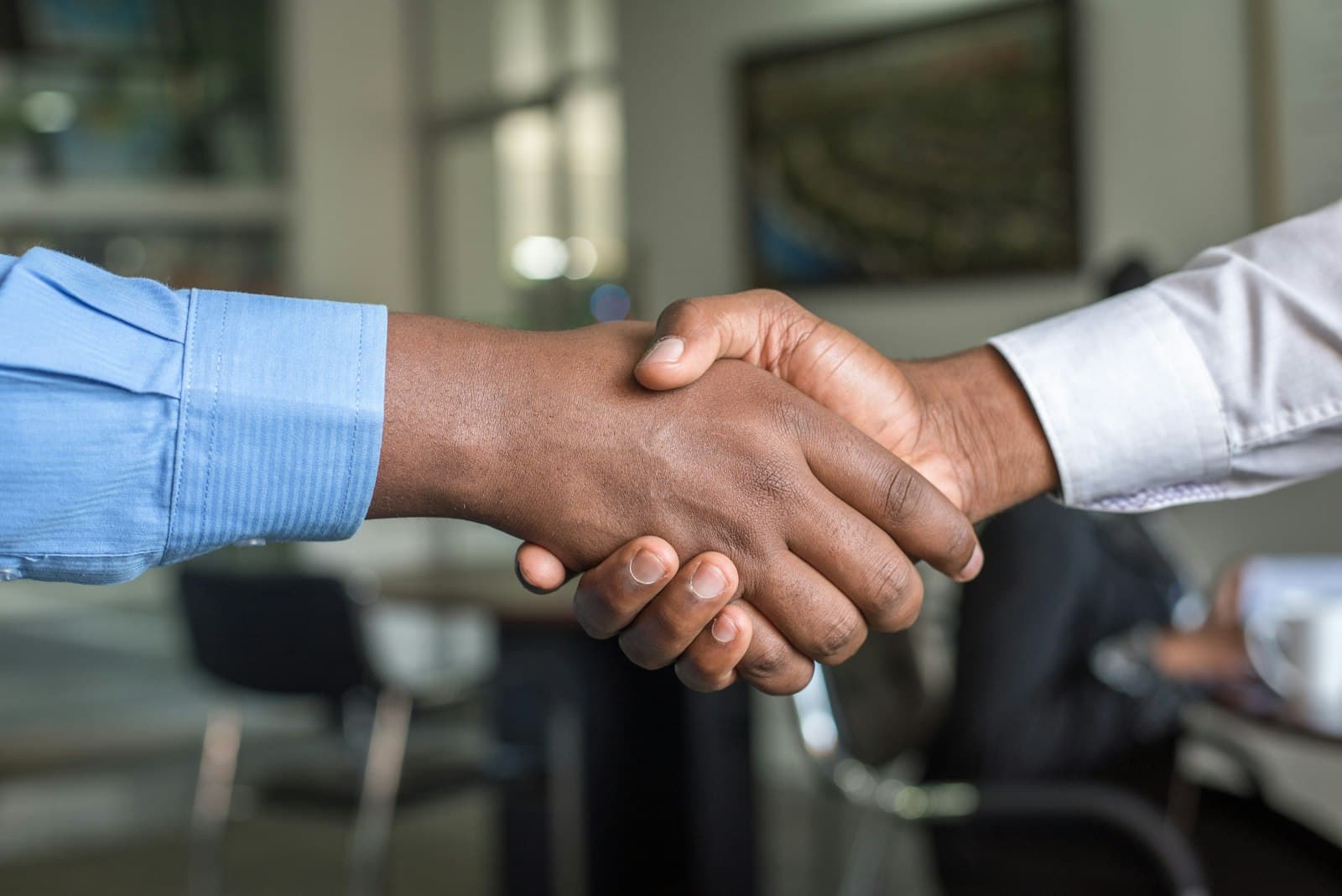 A handshake at the start of a new engagement